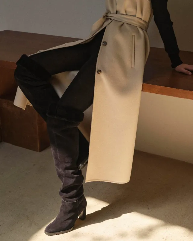 Bottes à talons en peau lainée sold by Yves Salomon