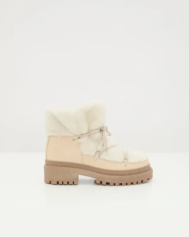 Boots lacées mi-hautes en peau lainée sold by Yves Salomon