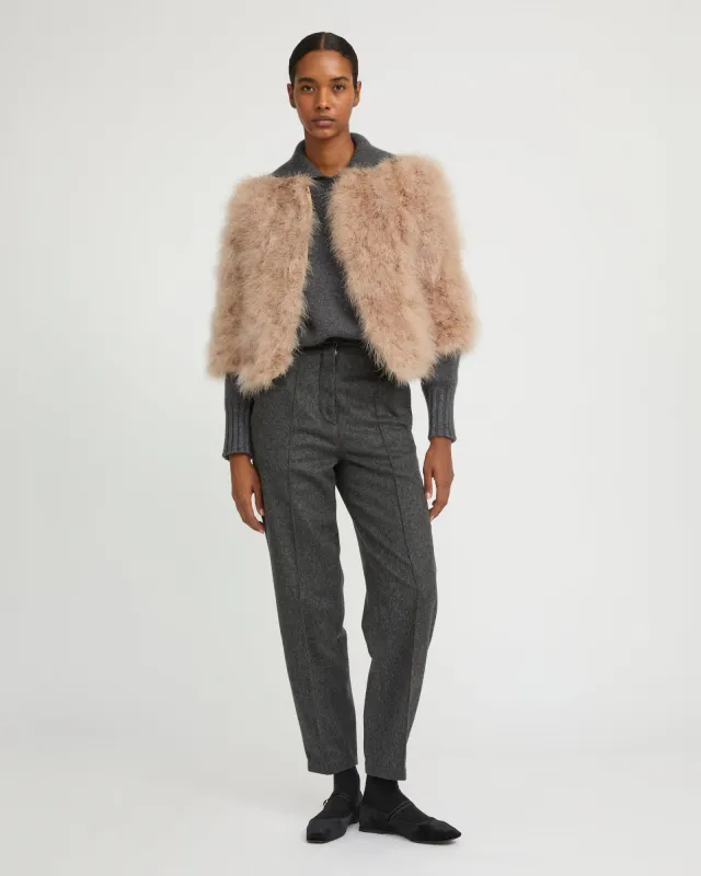 Veste courte en plumes sold by Yves Salomon