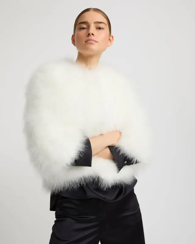 Veste courte en plumes sold by Yves Salomon