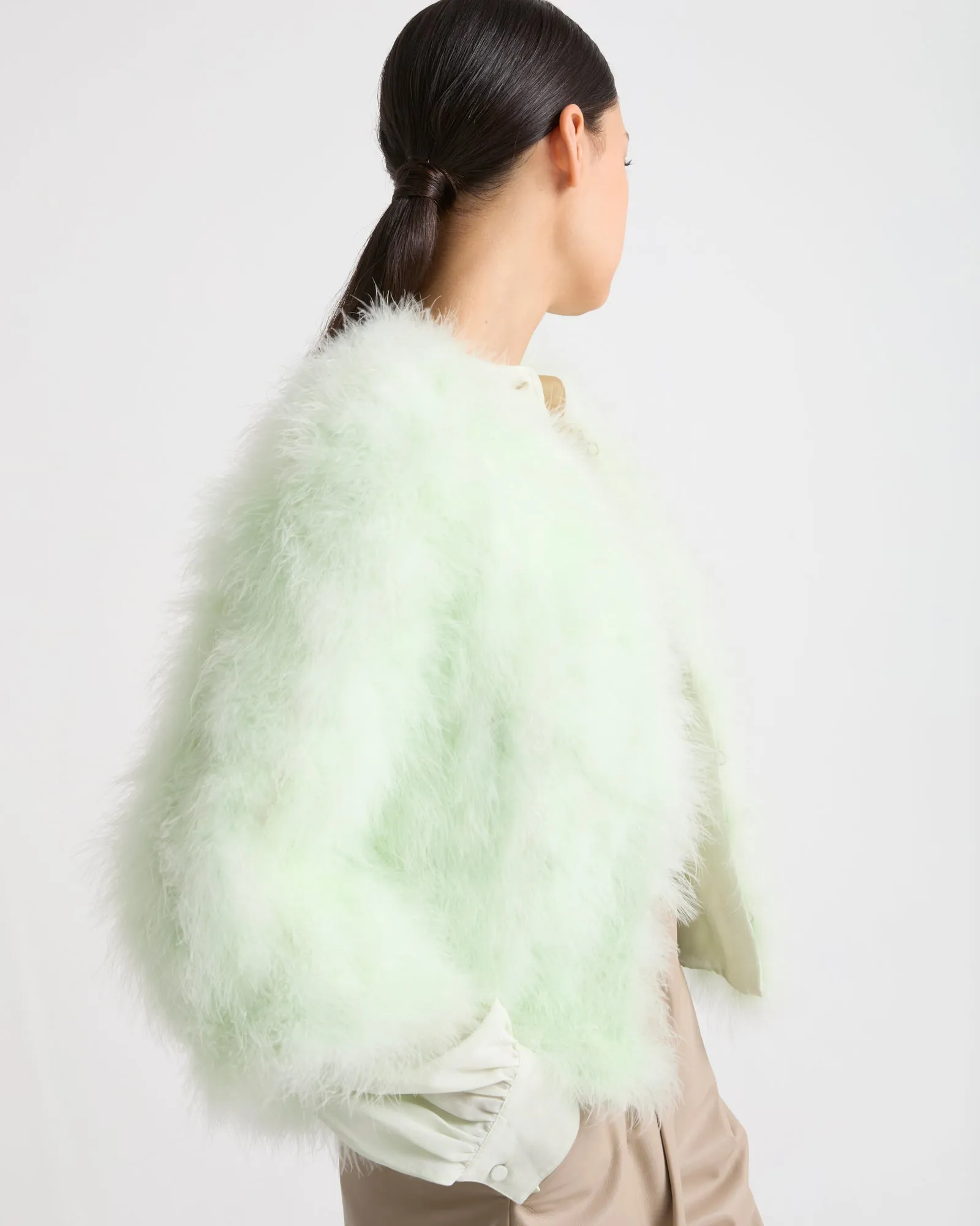 Veste courte en plumes sold by Yves Salomon