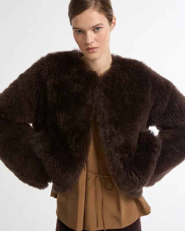 Veste courte en agneau long poil et maille mérinos sold by Yves Salomon