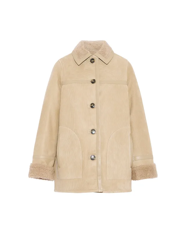 Veste en peau lainée retournée aspect velours côtelé sold by Yves Salomon