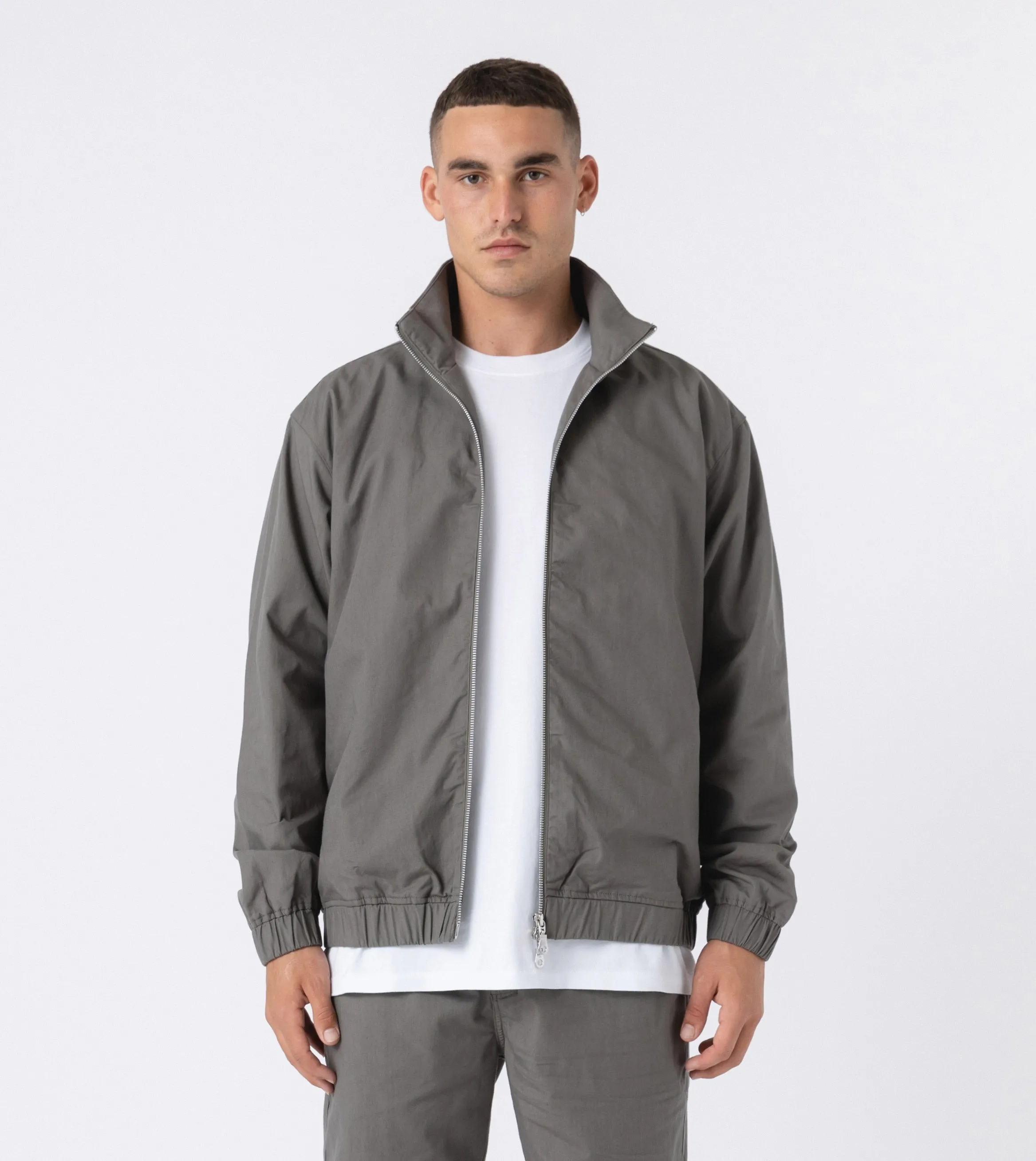 Primal Track Jacket Dk Moss sold by Zanerobe