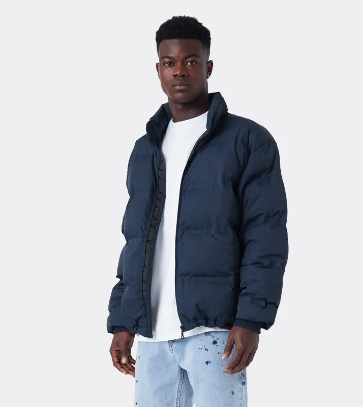 Powells Puffer Jacket Ink sold by Zanerobe