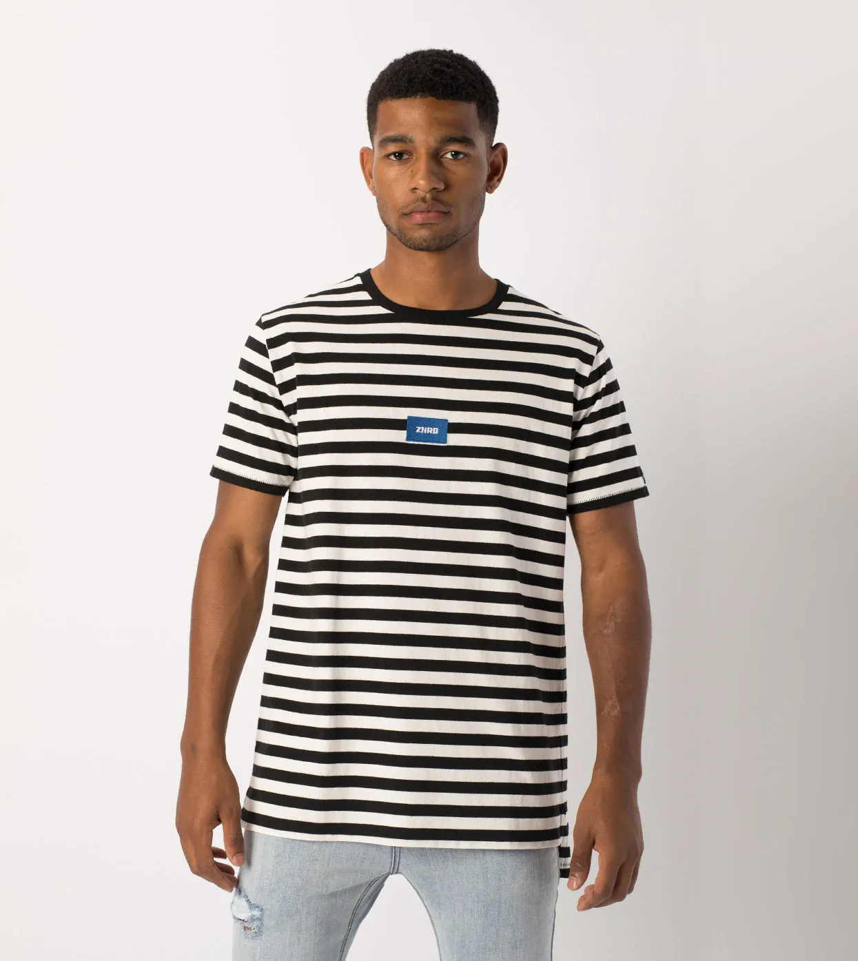 Label Flintlock Tee Black/White sold by Zanerobe