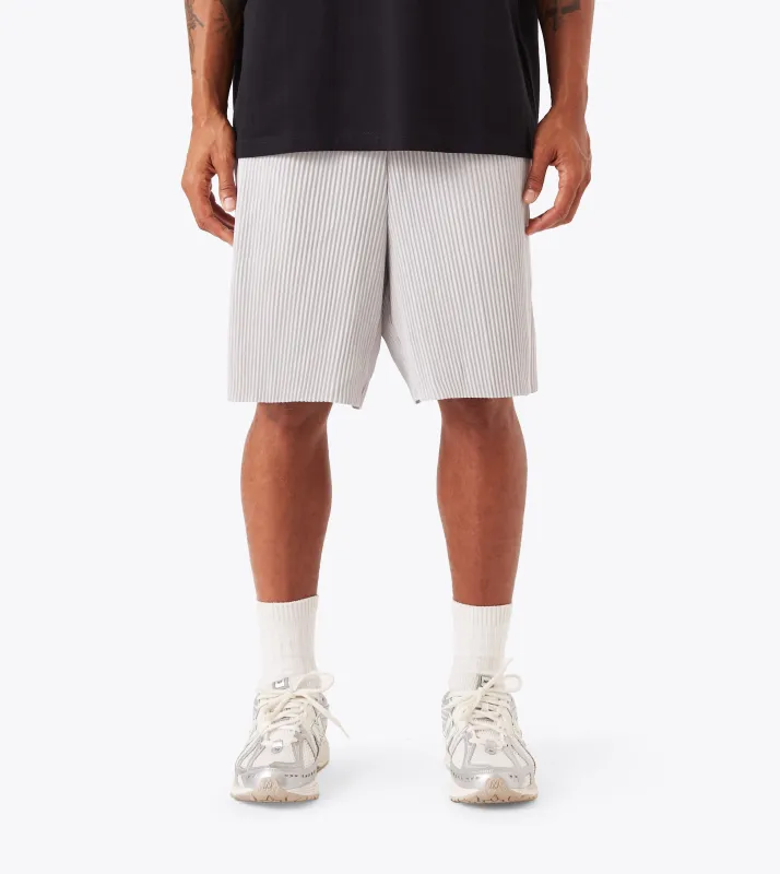 Pleated Short Cement sold by Zanerobe