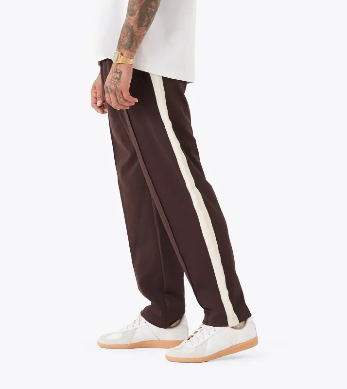 Stitched Football Trackpant Dk Choc made by Zanerobe