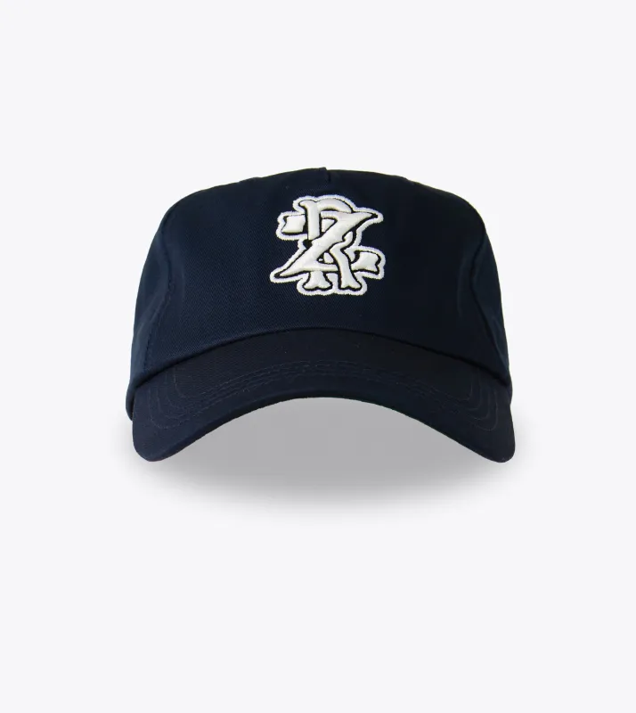 Monogram Snapback Navy sold by Zanerobe