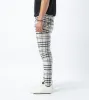 Check Snapshot Chino Milk/Vintage Black sold by Zanerobe