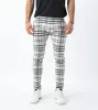 Check Snapshot Chino Milk/Vintage Black sold by Zanerobe