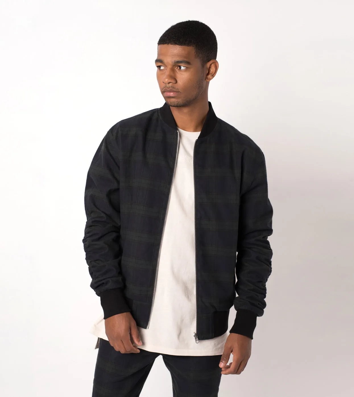 Plaid Reversible Bomber Ink/Forest sold by Zanerobe