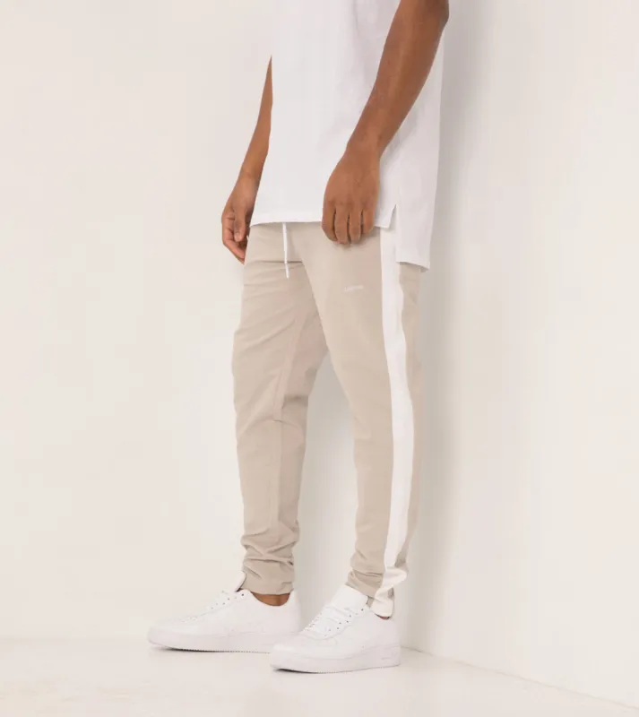 Jumpshot Track Pant Putty/White sold by Zanerobe