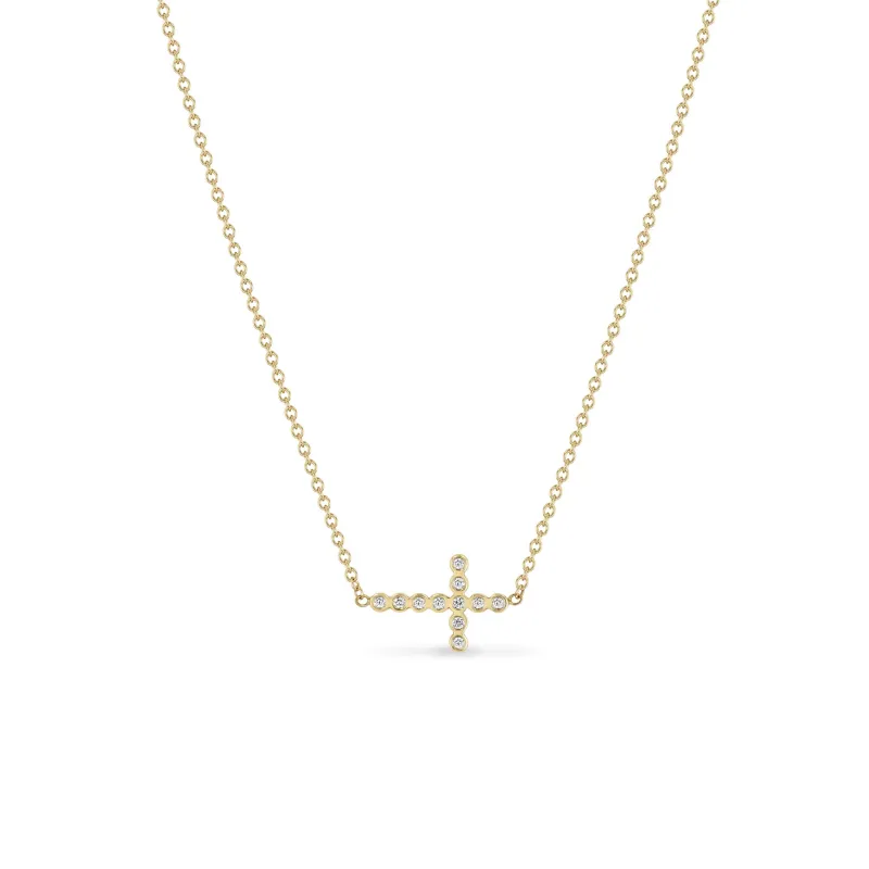 14k Small Diamond Bezel Cross Necklace sold by Zoe Chicco