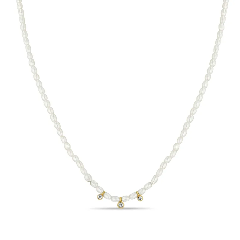14k 3 Graduated Diamond Bezel Rice Pearl Necklace sold by Zoe Chicco