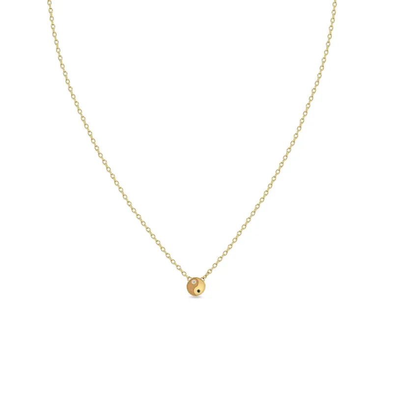 14k Itty Bitty Black & White Diamond Yin Yang Necklace sold by Zoe Chicco