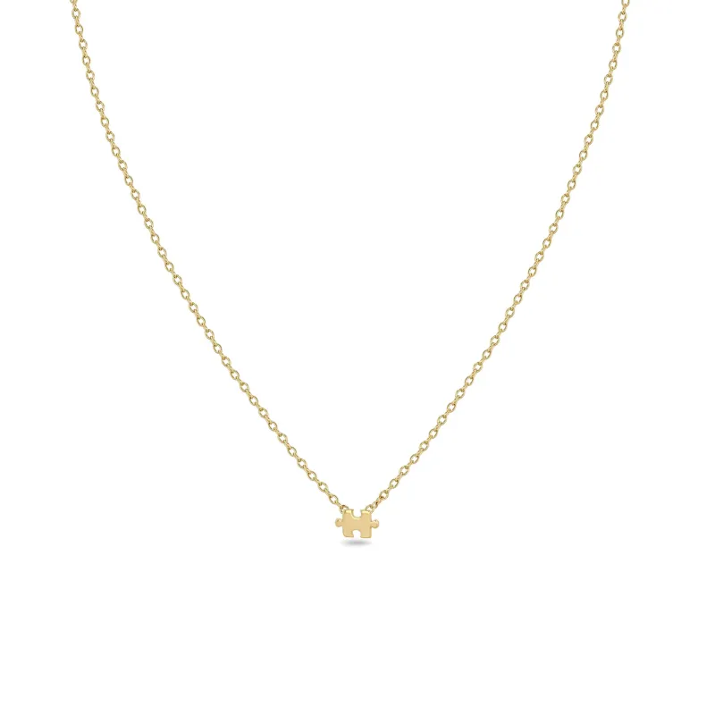 14k Itty Bitty Puzzle Piece Necklace sold by Zoe Chicco