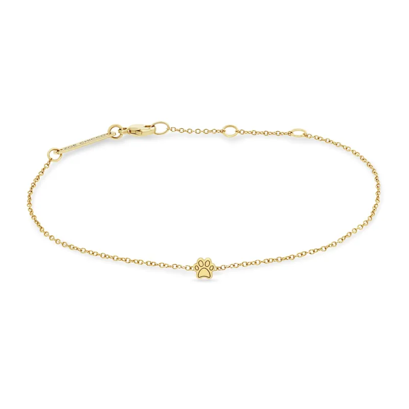 14k itty bitty dog paw bracelet sold by Zoe Chicco