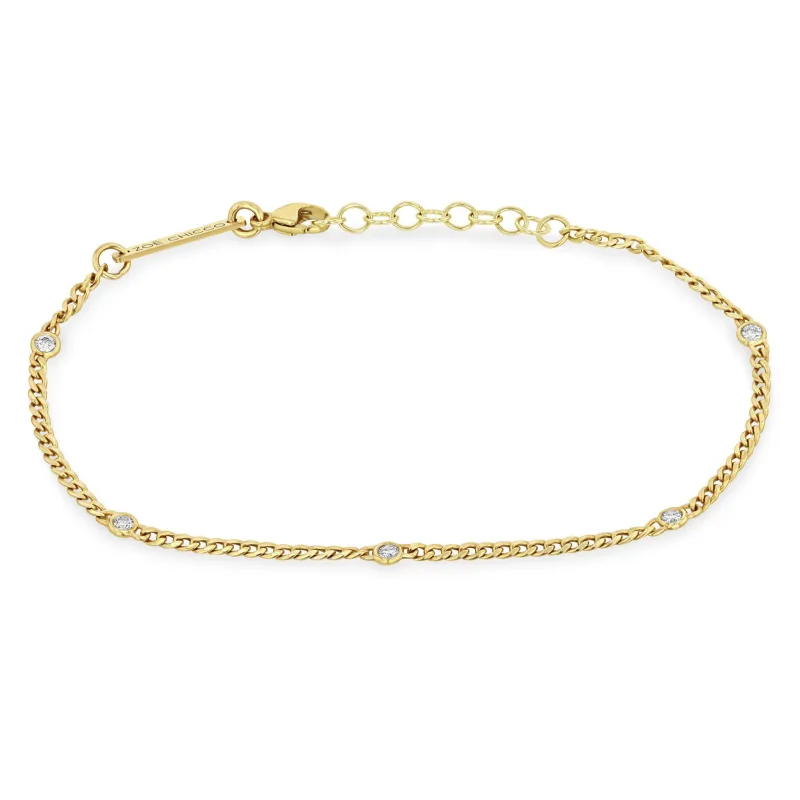 14k Extra Small Curb Chain Bracelet with 5 Floating Diamonds sold by Zoe Chicco