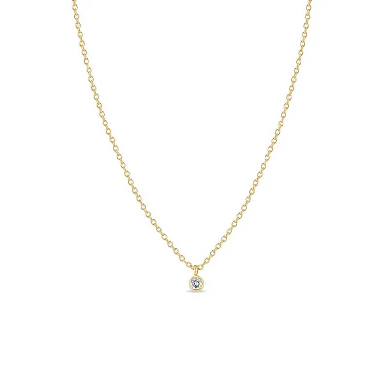 14k Single Diamond Bezel Pendant Necklace sold by Zoe Chicco