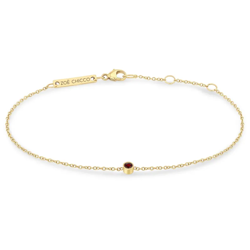 14k Single Garnet Bezel Bracelet | January Birthstone sold by Zoe Chicco