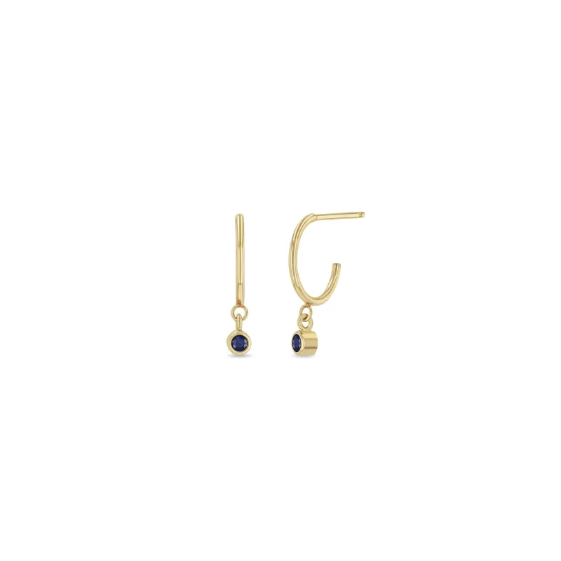 14k Dangling Blue Sapphire Huggie Hoops | September Birthstone sold by Zoe Chicco