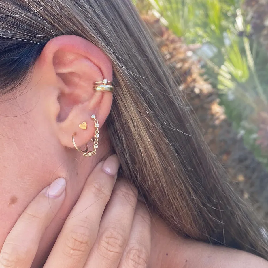 14k Itty Bitty Heart Reverse Huggie Hoop Earring sold by Zoe Chicco product image thumbnail 3