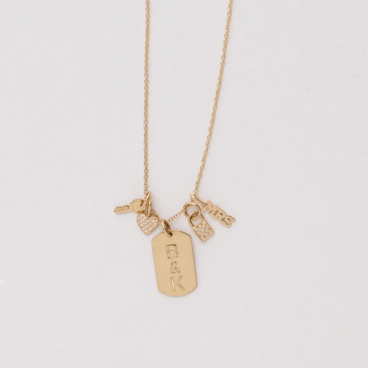 14k Single 2 Initial Letters Small Dog Tag Charm sold by Zoe Chicco product image thumbnail 2