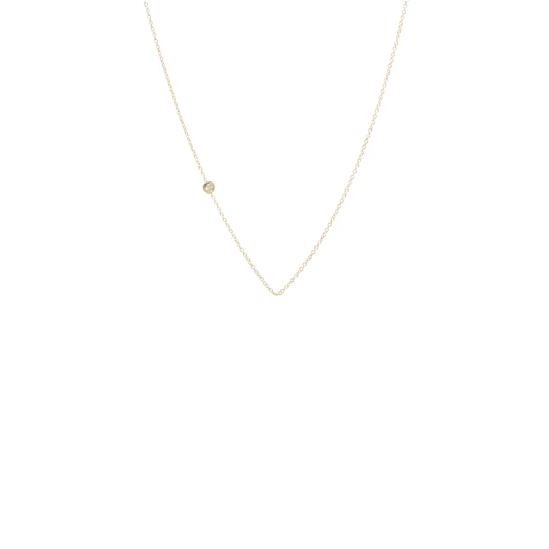 14k small floating diamond chain sold by Zoe Chicco
