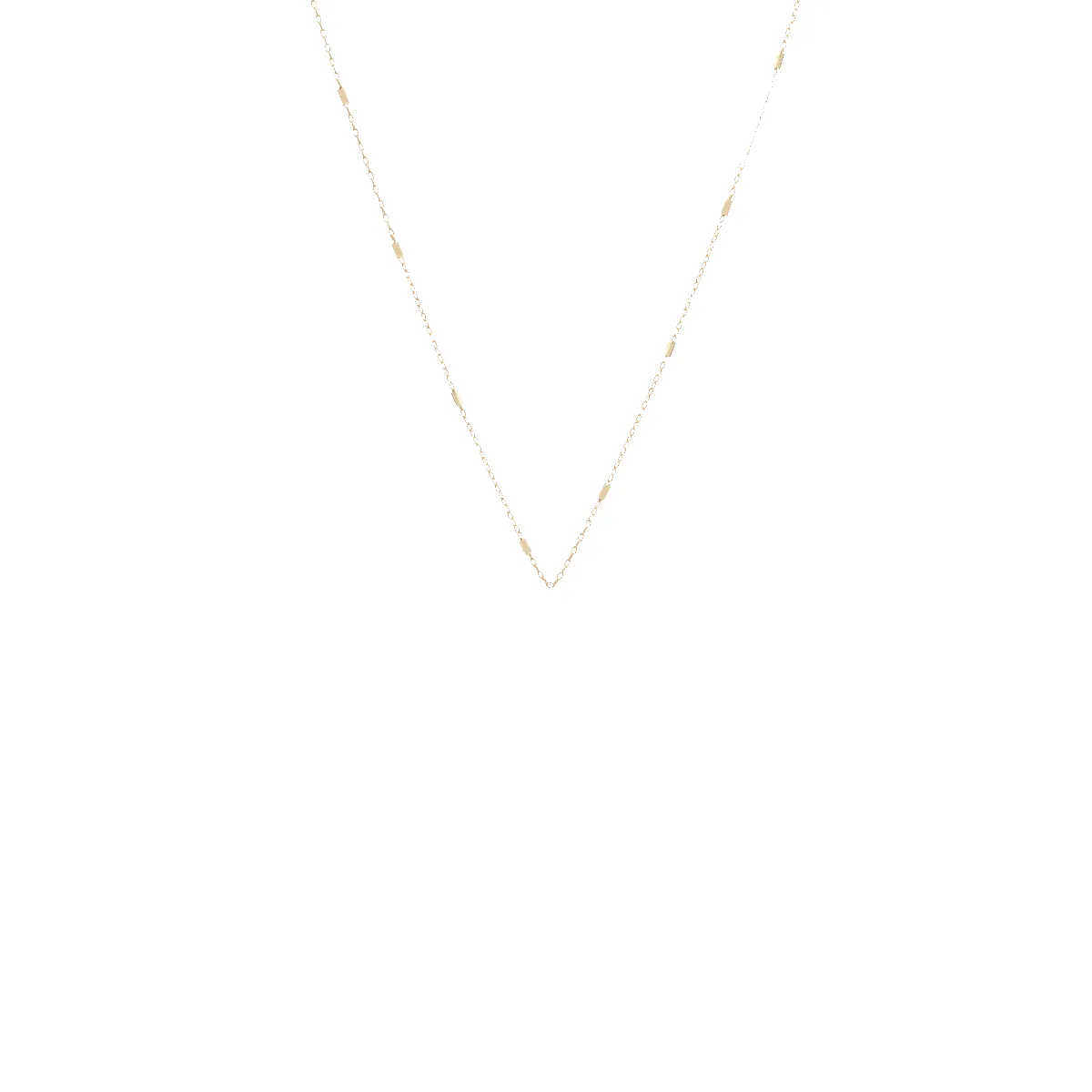 14k tiny bar cable chain sold by Zoe Chicco