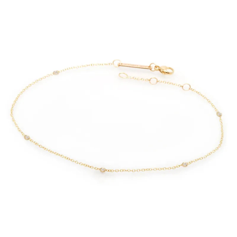 14k Floating Diamonds Anklet sold by Zoe Chicco