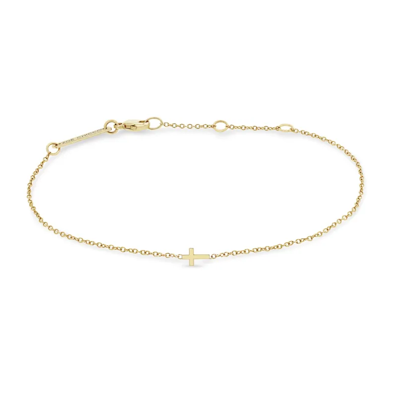14k Itty Bitty Cross Bracelet sold by Zoe Chicco