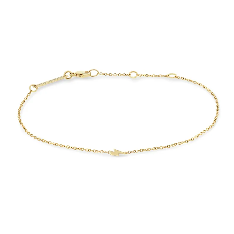 14k itty bitty lightning bolt bracelet sold by Zoe Chicco