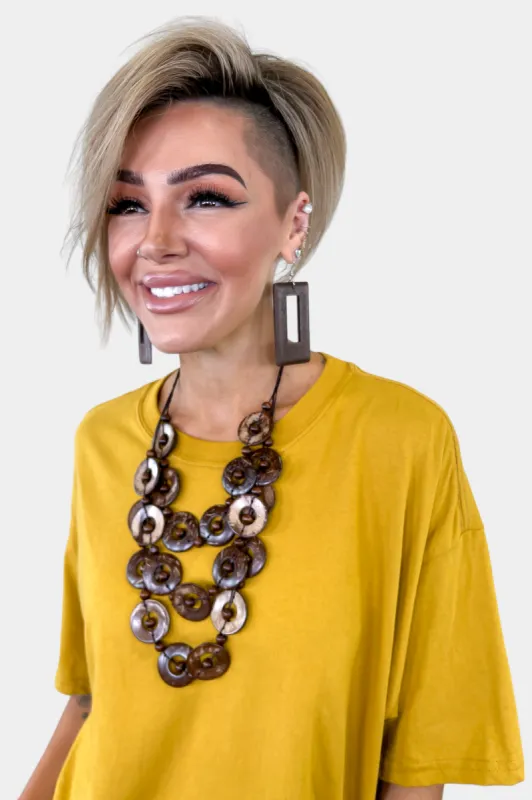 Wooden Disc Necklace sold by ZZs