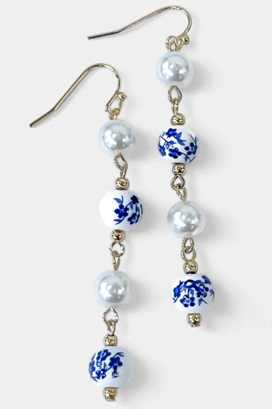Blue Floral Pearl Dangle Earrings sold by ZZs