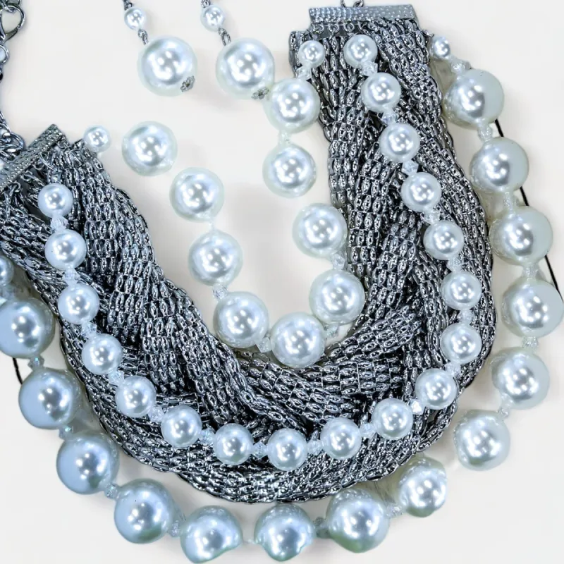 Silver Metal Braided Statement Necklace sold by ZZs