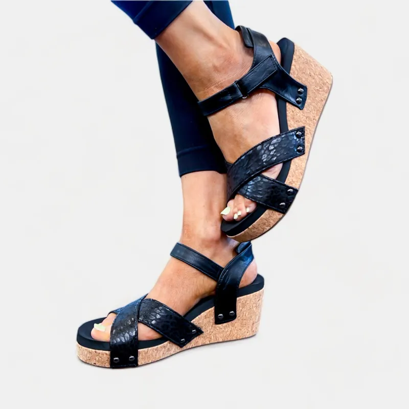 Black Leopard Kindle Wedge Sandals sold by ZZs