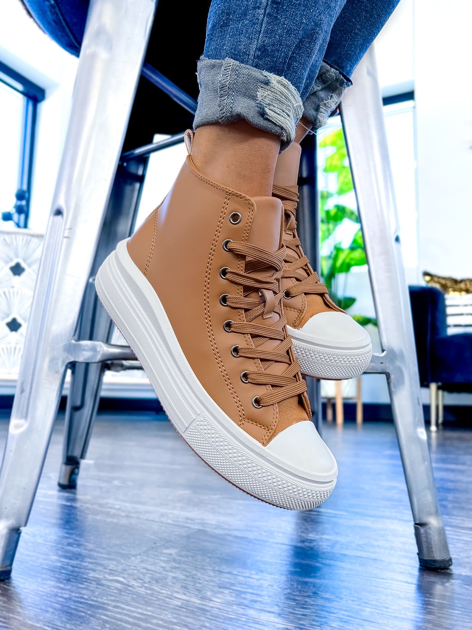 Tan High Top Sneakers sold by ZZs