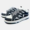 Black & White Racer Sneakers sold by ZZs