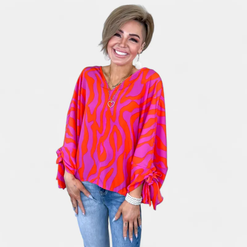 Orange & Pink Wavy Abstract Top sold by ZZs