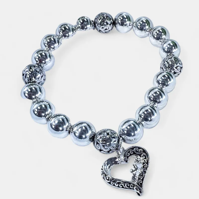 Antique Silver Open Heart Charm Bracelet sold by ZZs
