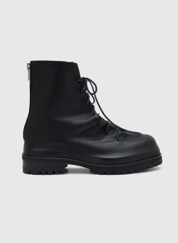 LACED UP MARATHON BOOTS WASHED IN BLACK sold by 424