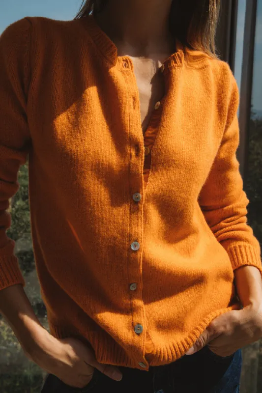 Orange History cardigan  sold by Balzac Paris
