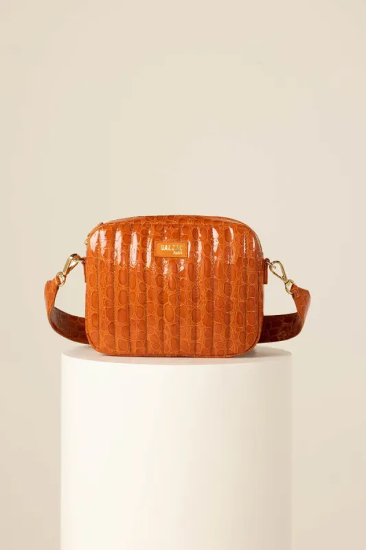 Orange crocodile embossed Cesar bag made by Balzac Paris