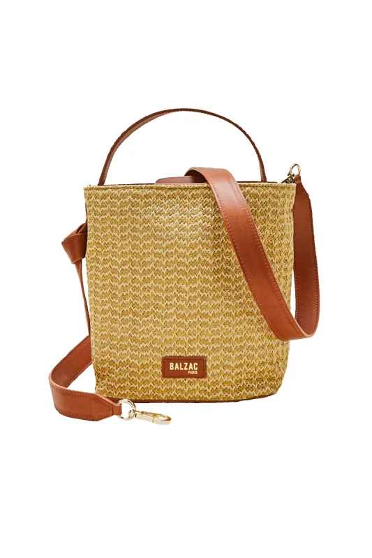 Bi-material raffia and camel Orion bag sold by Balzac Paris