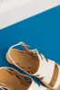 Regatta ecru patent sandals sold by Balzac Paris