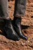 black croc-effect embossed laeticia ankle boots sold by Balzac Paris