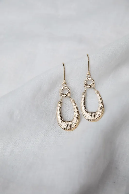Golden Oval earrings sold by Balzac Paris