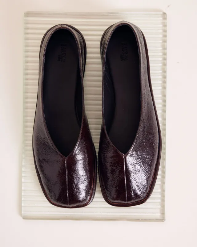 Elise chocolate crinkled patent leather ballerinas sold by Balzac Paris