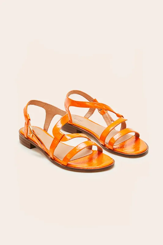 Orange patent Margarita sandals sold by Balzac Paris